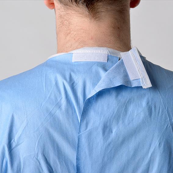 L'abito chirurgico eliminabile comodo, medico antibatterico sfrega i vestiti