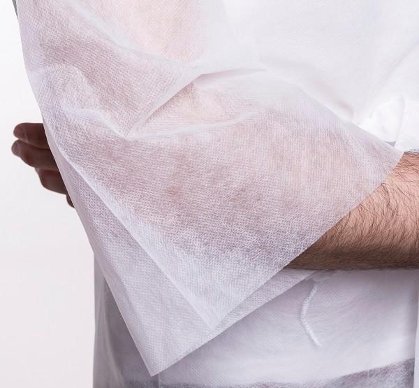 La professione d'infermiera non tessuta di alta qualitÃ  pp uniforma il breve cappotto del laboratorio